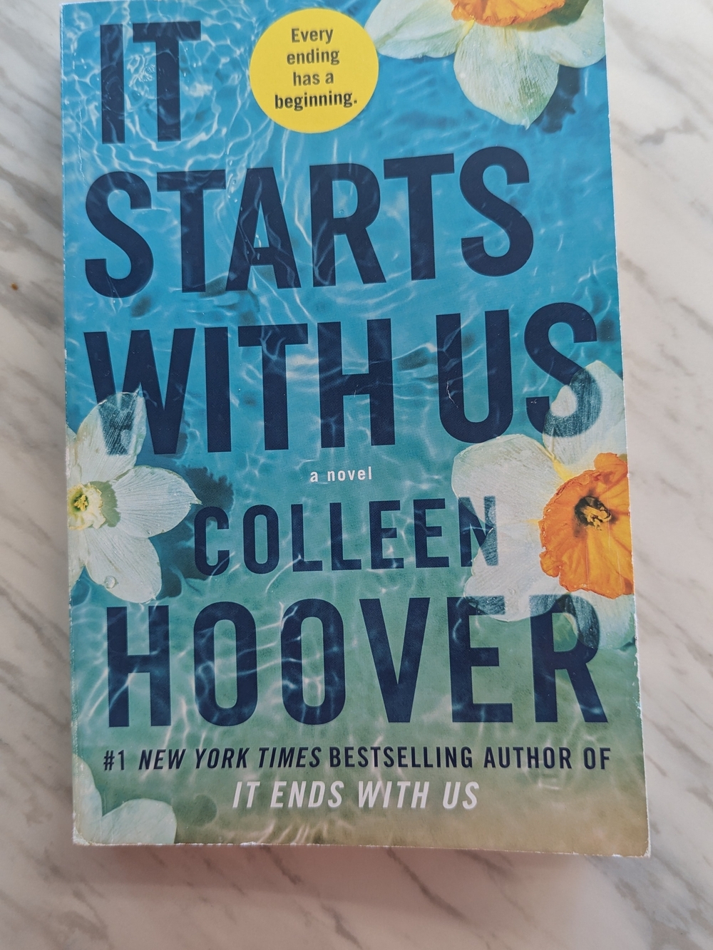 It Starts With Us by Colleen Hoover - Blue Floral Paperback